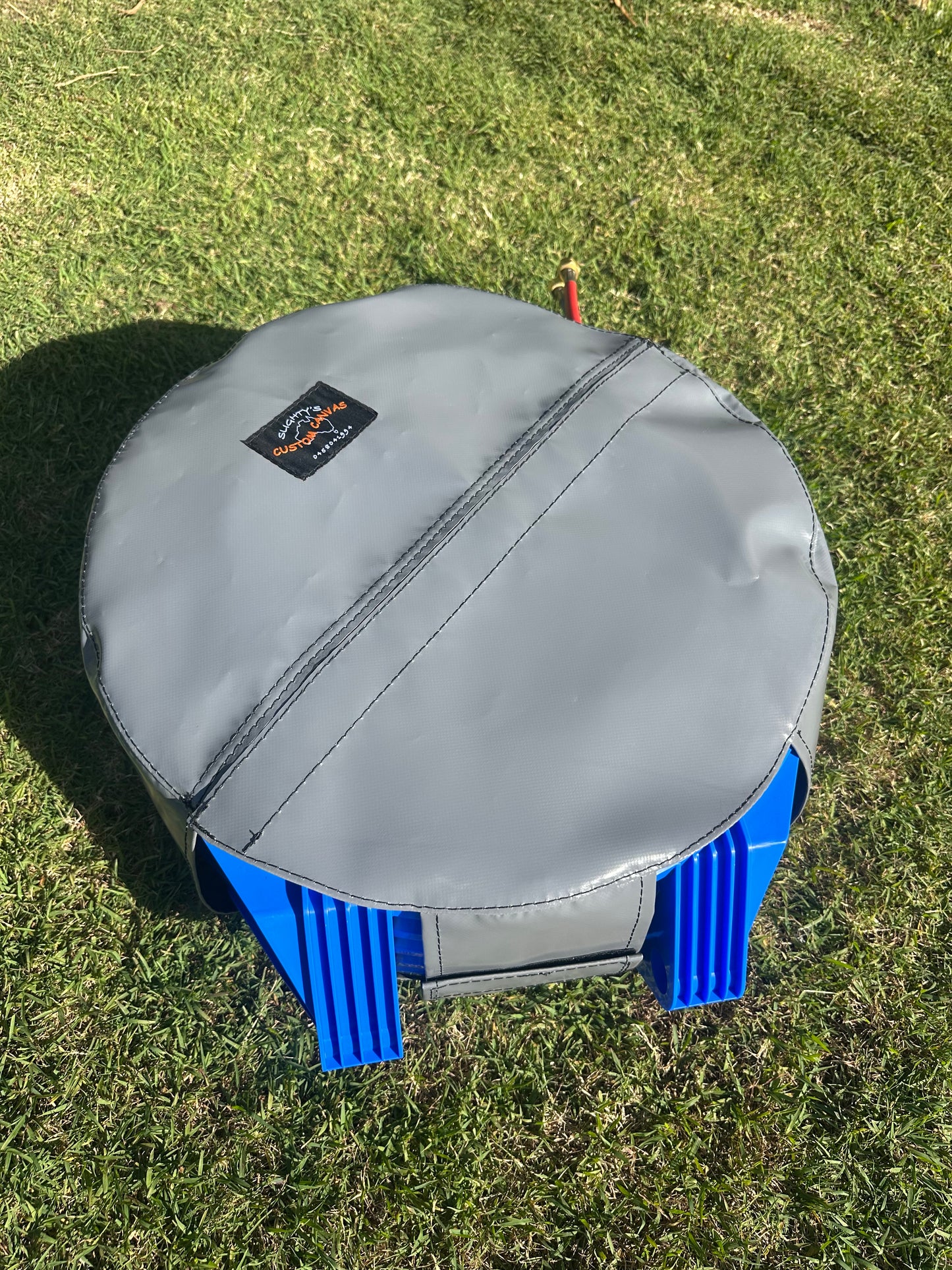 "Retracta" hose reel cover
