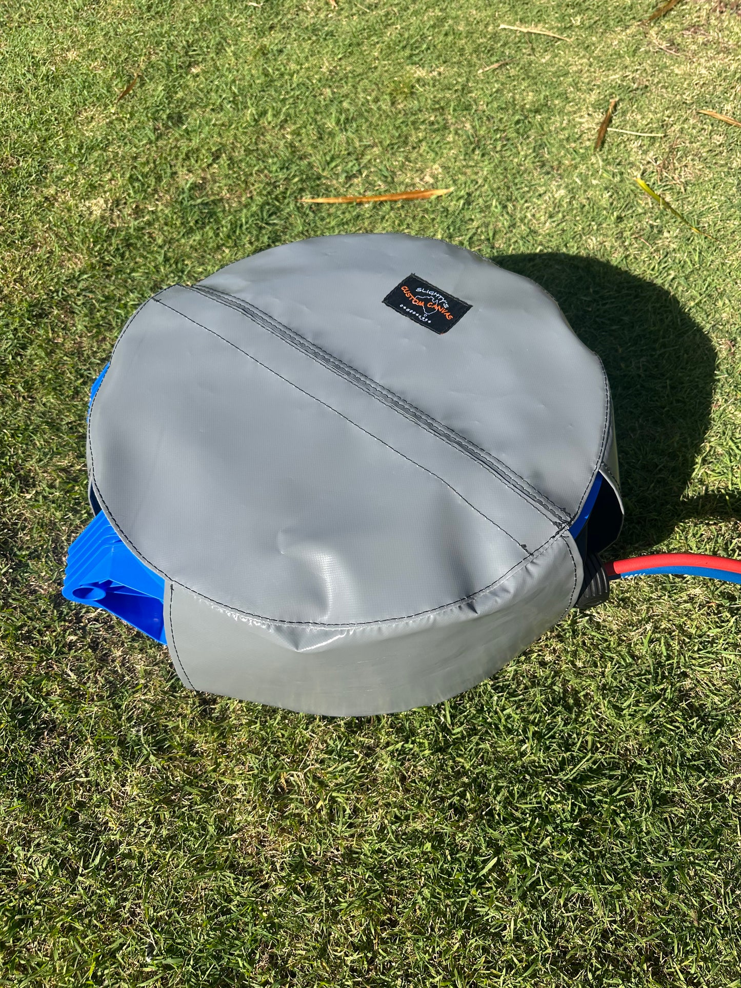 "Retracta" hose reel cover