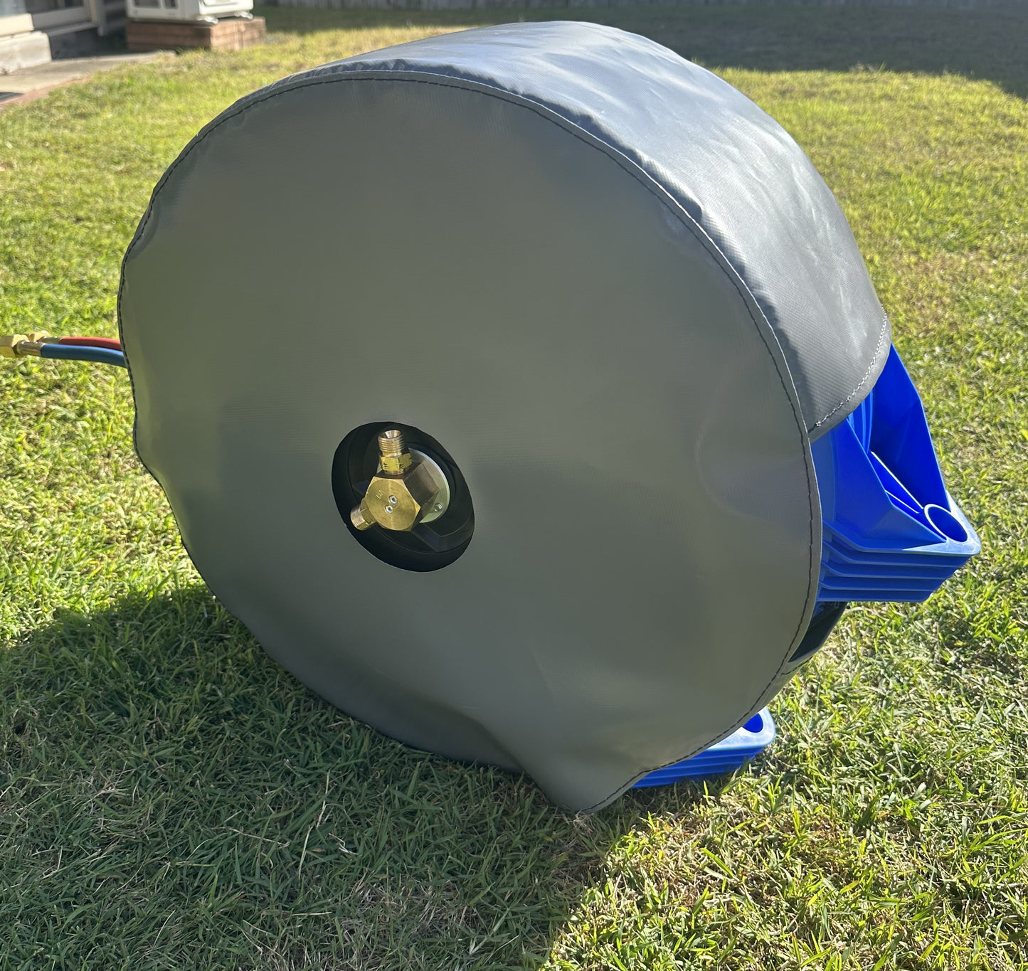 "Retracta" hose reel cover